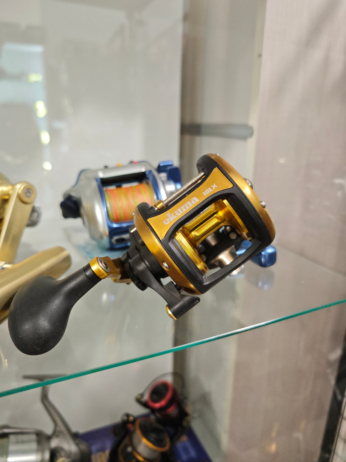 Okuma 10 sinistro comodissimo frizione a leva con guidafilo